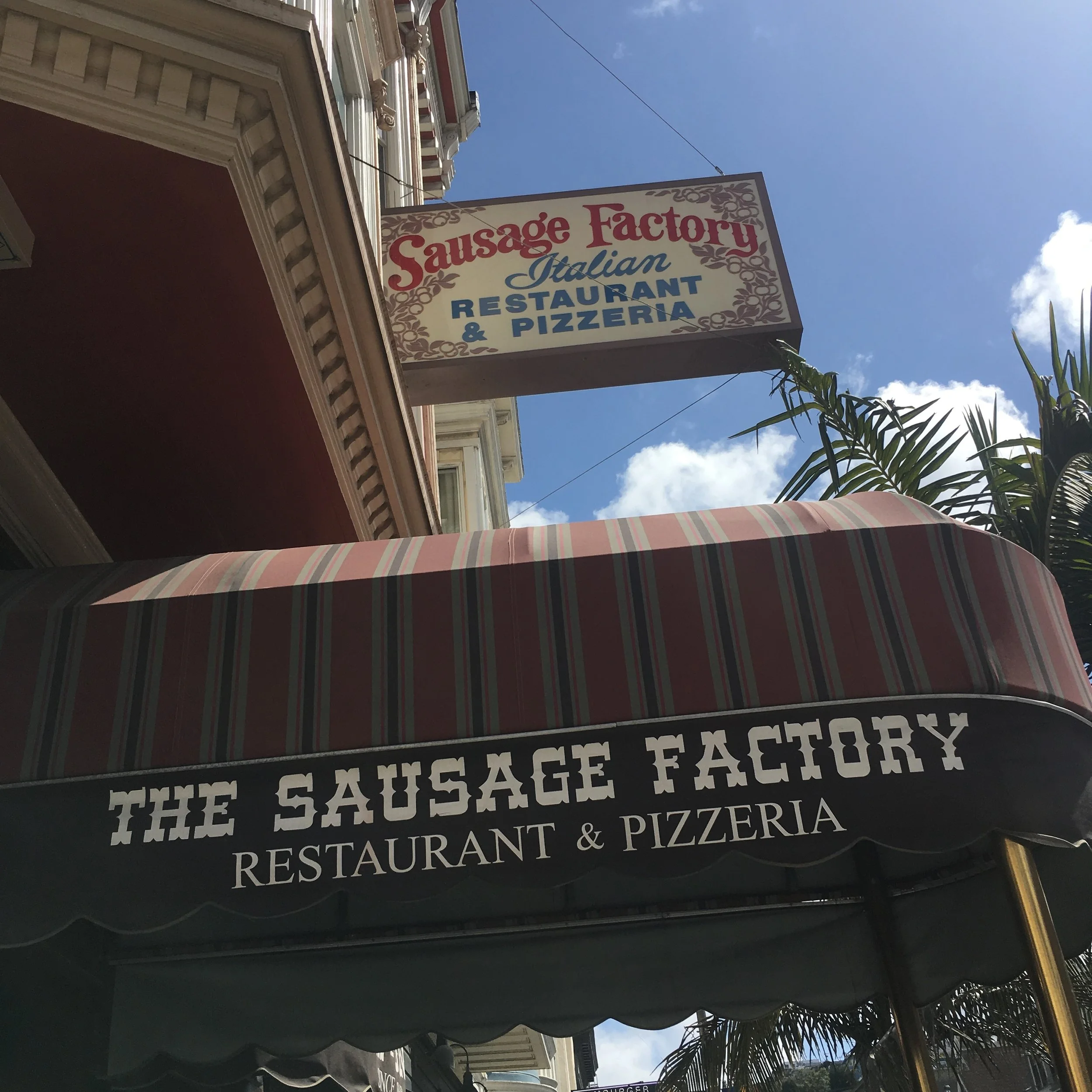 The vintage Sausage Factory sign and awning on Castro Street