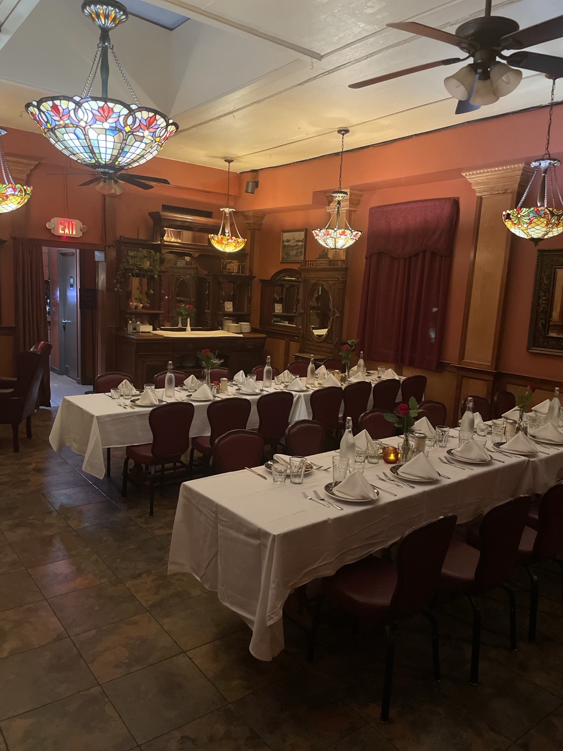 The warm, historic dining room at The Sausage Factory