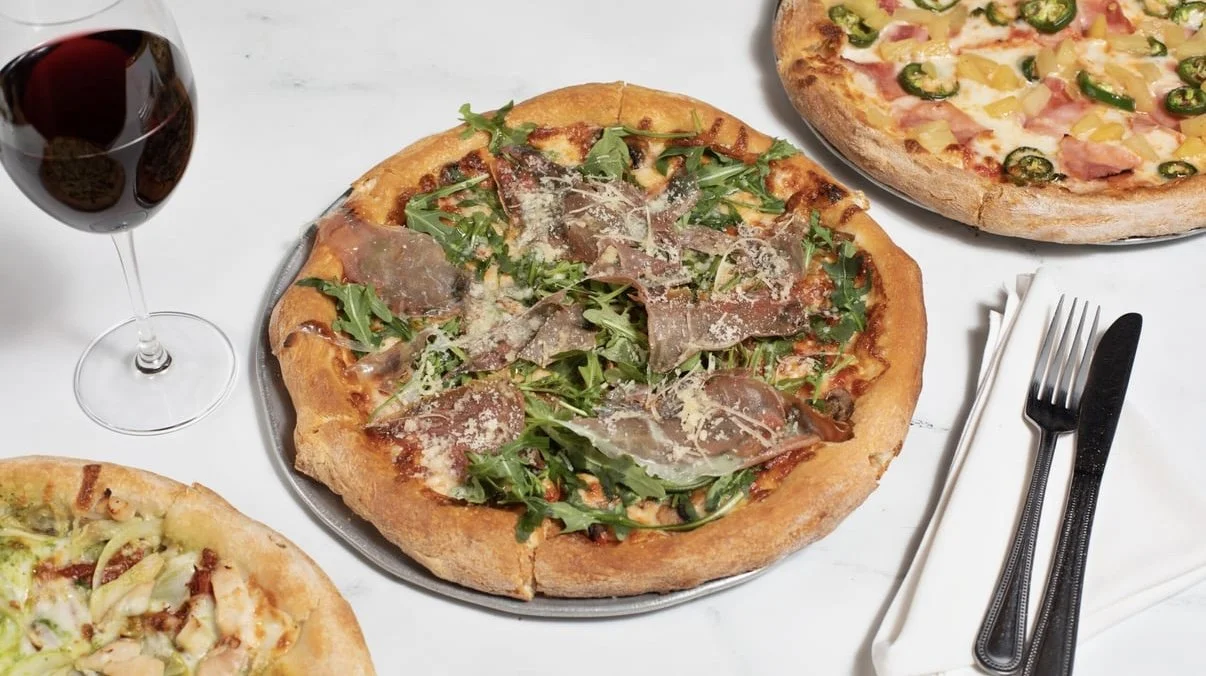 House pizzas ready for the table